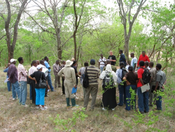 A group of people attending a ArboLiDAR training in forest